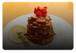Melanzane alla parmiggiana e pomodori semisecchi (semi dried) freschi di Pomup